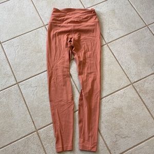 ALIGNED ANGLES SUPER HIGH RISE TIGHT 28"
Rustic Coral